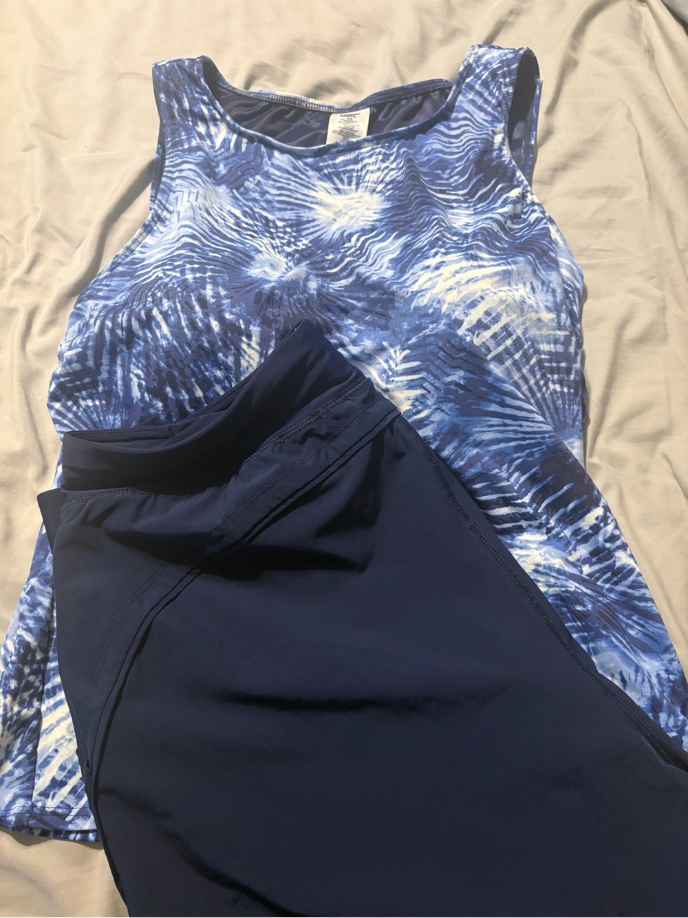 Blue & White Swirl Tank Top (20W) and swim shorts (18W)
